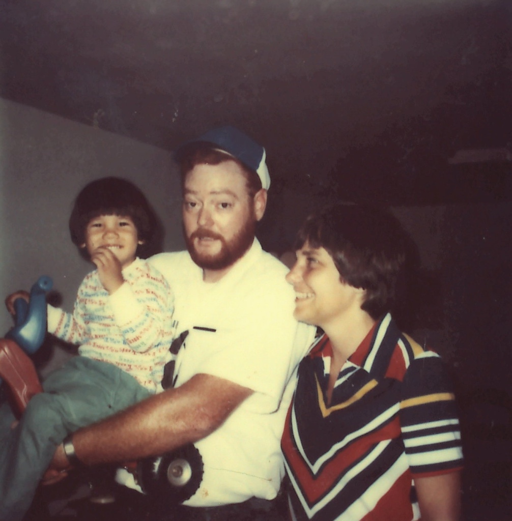 David as a young child with his parents